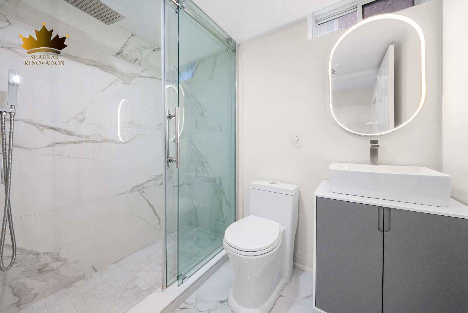 bathroom with white theme renovation by Shahkar renovation compay